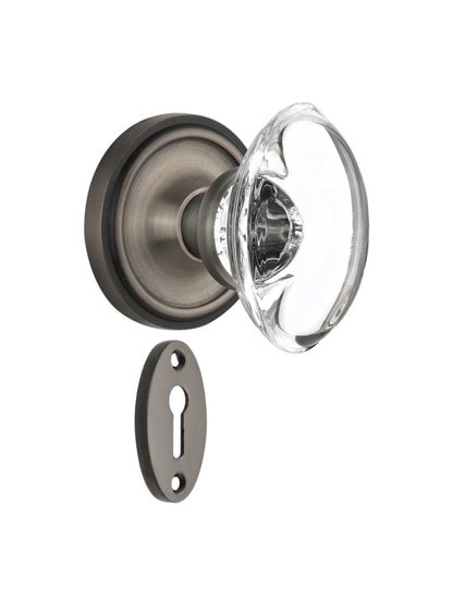 Classic Rosette Mortise-Lock Set with Oval Crystal Glass Knobs in Antique Pewter.
